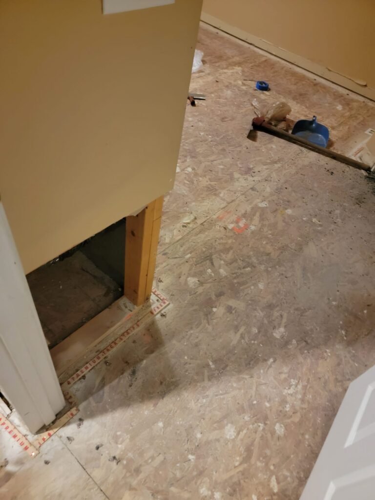 Room under renovation, subfloor visible | The Bearded Contractor